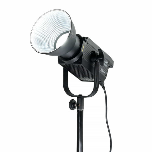Nanlite FS-150B Bi-Color AC LED Monolight front/side view with 45 degree reflector mounted on stand tilted up emitting bright white light