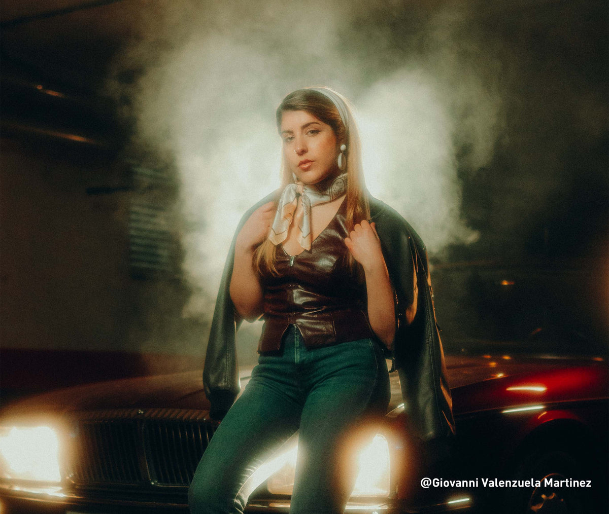 Cinematic retro automotive portrait shoot with RGB tube light backlighting, smoky atmosphere, warm golden tones for creative editorial photography