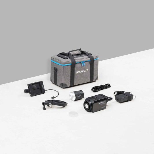 Nanlite Forza 60C RGBLAC Spotlight contents with NPF Battery Grip, Bowens adapter for FM Mount, 45 degree mini reflector, protective COB cap, power adapter with v-mount plate, power cable, and padded carrying case