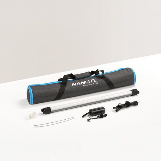 Nanlite PavoTube II 15C 2-foot RGBWW LED Tube Light contents with two safety cables, T12 mounting clip, DC:15V power adapter, and padded carrying case